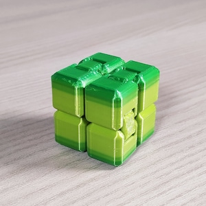 Fidget Cube contre le Stress Vert - Fidget Toys - Balle Anti-Stress - Jouets  - Vert/Noir