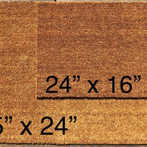 May include: Two rectangular doormats made of natural brown coir fiber. The larger mat measures 35" x 24", and the smaller one is 24" x 16". The mats are designed for outdoor use and are likely used to wipe shoes.