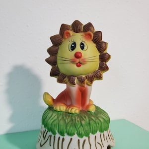 Lion Music Box/Figurine, Rotating Musical Ceramic Lion, Plays A Spoonful of Sugar