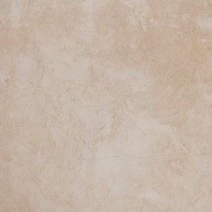 May include: A close-up of a light beige textured wall with a subtle crack running horizontally across the surface.