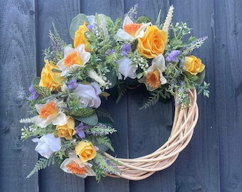 Spring Easter wreath with yellow roses, white roses, white daffodils, lavender, astilbe. Wreath for front door, Easter wreath, spring wreath