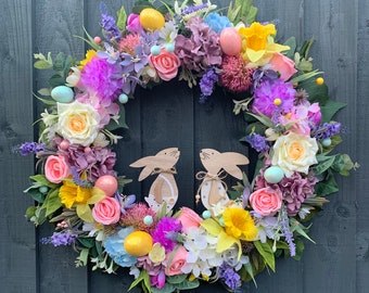 Easter / spring wreath for your front door, with daffodils, Easter eggs, roses, hydrangeas