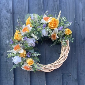 Spring Easter wreath with yellow roses, white roses, white daffodils, lavender, astilbe. Wreath for front door, Easter wreath, spring wreath
