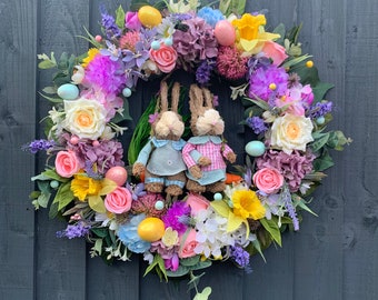 Easter / spring wreath for your front door, with daffodils, Easter eggs, roses, hydrangeas