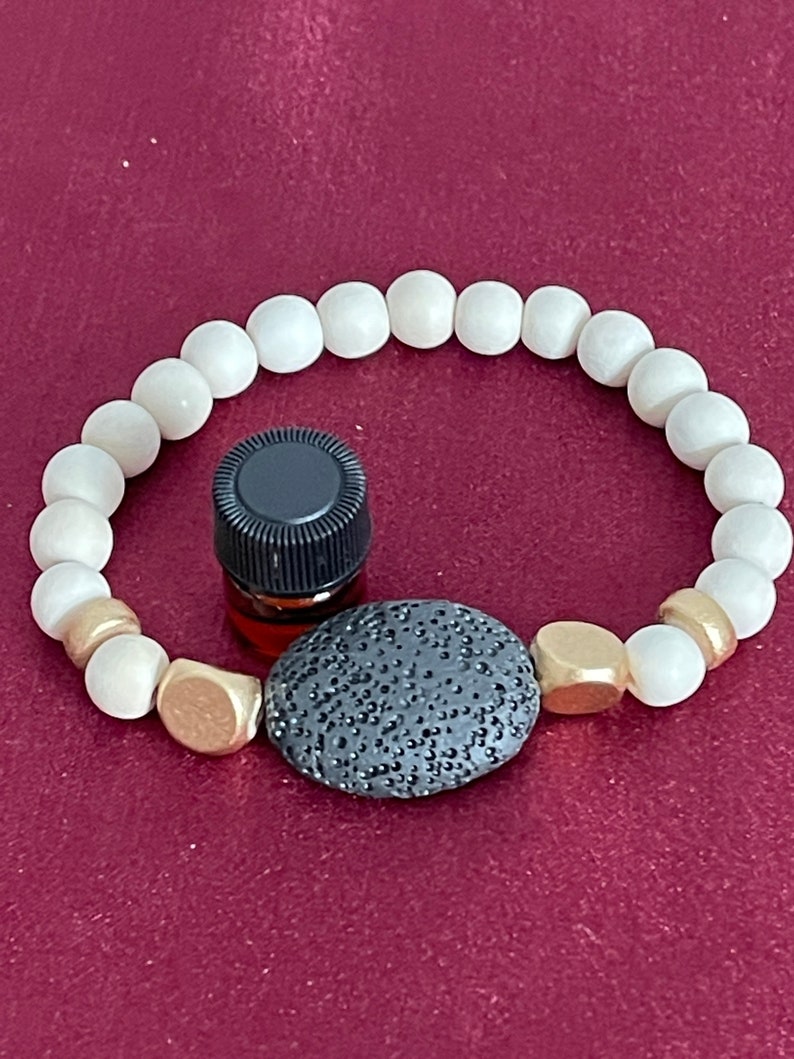 Black Lava And White Dyed Wood Beads Scent Bracelet with a Small Sample of D\u014dTERRA Lavender Essential Oil 8-9mm beads