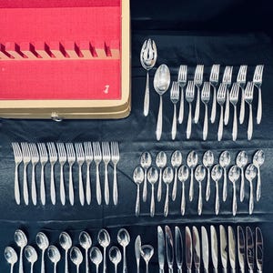 56pc Silverplated Flatware by Gorham, the Flower Song pattern, with case.