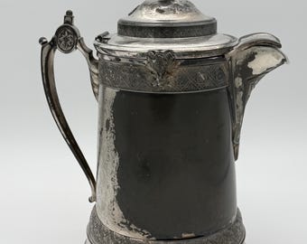 Silver Plate Water Pitcher by Reed and Barton in their 1865 pattern.