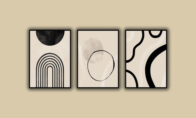 May include: Three abstract art prints with black and white geometric shapes on a beige background. The prints feature a semi-circle, a circle, and a series of curved lines.