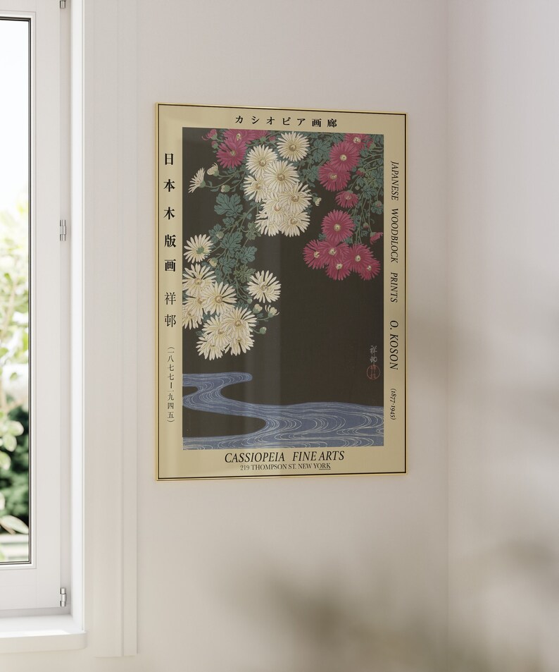 May include: A vintage Japanese woodblock print by O. Koson, featuring a floral design of white and pink chrysanthemums against a dark background. The print is titled "Japanese Woodblock Prints" and includes the artist's name and dates. The print is framed and has a gold border.