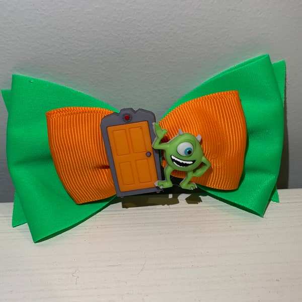 Disney Pixar Monsters Inc Mike Wazowski Ear Saver Mask Holder Bow