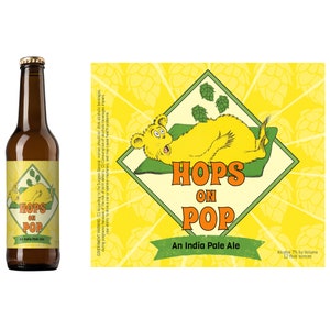 May include: A yellow and green beer label with a cartoon bear lying on a green pillow. The label says "Hops on Pop" and "An India Pale Ale". The beer is 7% alcohol by volume and 12 fluid ounces.