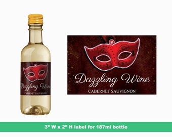 May include: A 187ml bottle of Cabernet Sauvignon wine with a label featuring a red masquerade mask with rhinestones and the text "Dazzling Wine".