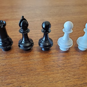 Chess piece valve stem covers - black, white, glow in the dark