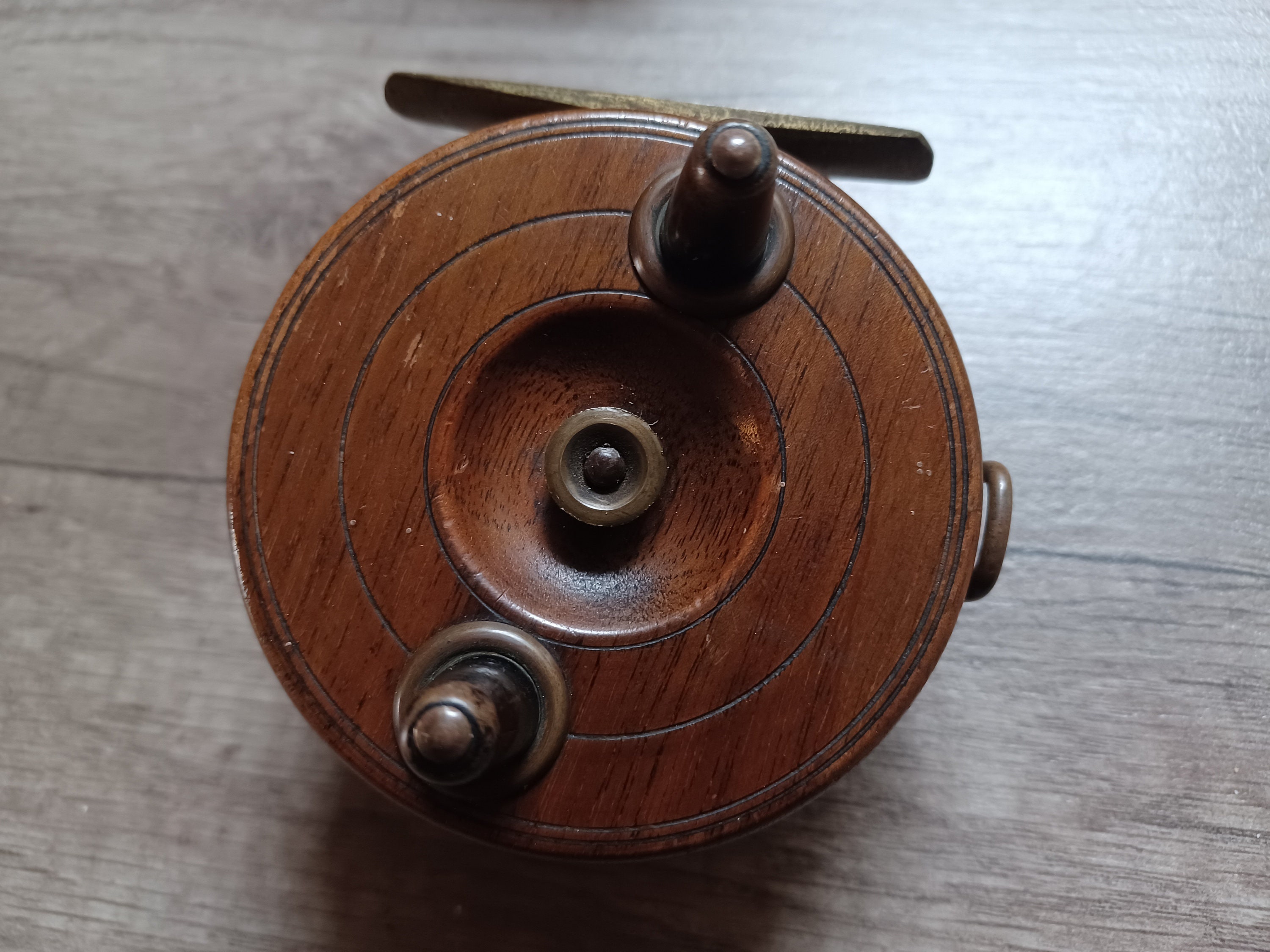 A Small Vintage Wood and Brass Starback Centrepin Reel, Nottingham Style,  Complete With a Brass Line Guide