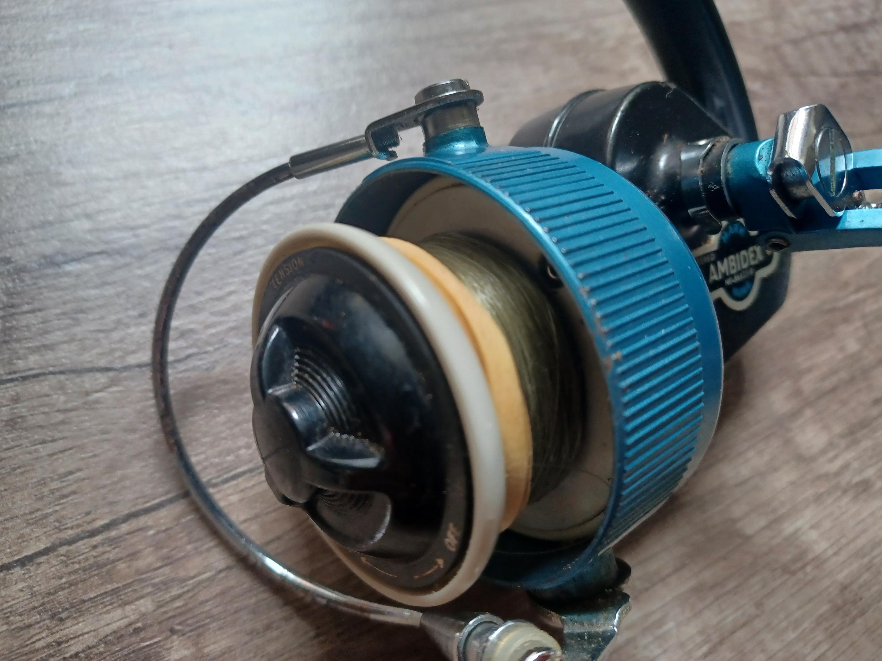 ambidex fishing reel sale A Classic Blue / Black Vintage Ambidex Mark Nine Spinning Reel (fixed  Spool) 1965. With Bag