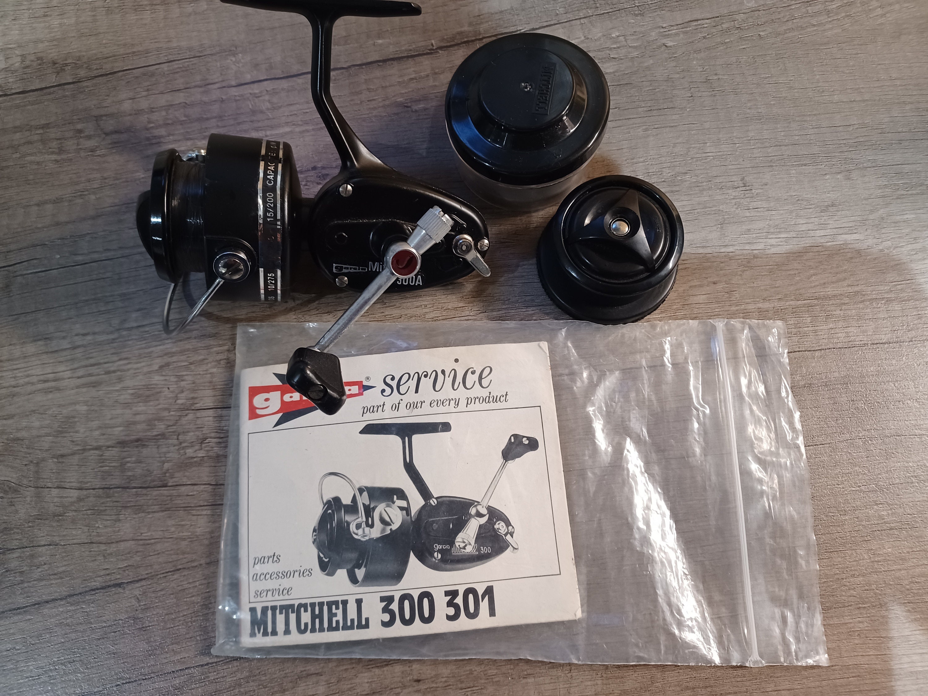 A Very Good Garcia Michell 300A Spinning Reel 1979 Vintage with Spare Spool  and Service Booklet