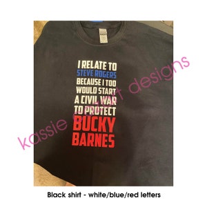 May include: Black t-shirt with white text that reads "I relate to Steve Rogers because I too would start a civil war to protect Bucky Barnes". The text is in white, blue, and red.
