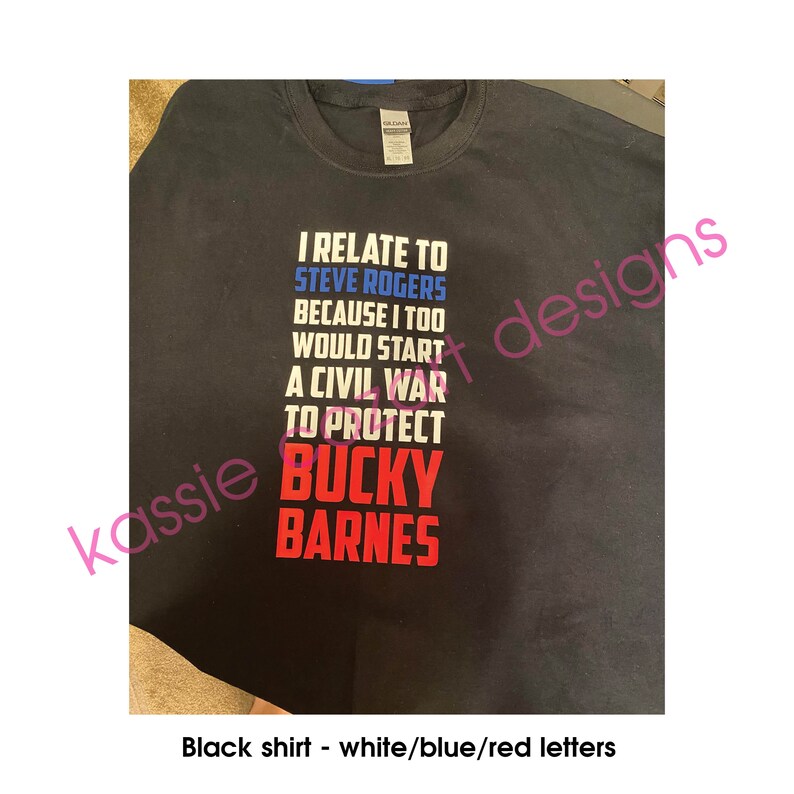 May include: Black t-shirt with white text that reads "I relate to Steve Rogers because I too would start a civil war to protect Bucky Barnes". The text is in white, blue, and red.