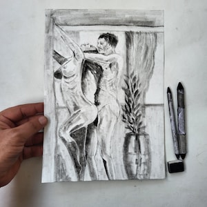 May include: A charcoal drawing on paper depicting two figures in an intimate embrace near a window with a curtain and a potted plant. The artwork features monochromatic shading and highlights, capturing the silhouettes and forms of the figures.