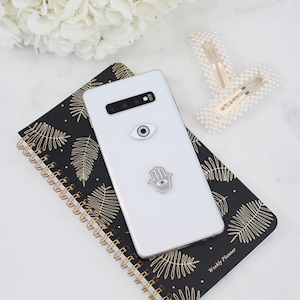 Evil Eye & Hamsa Metal Sticker Charms S/2 Decor For Phones Cases Laptops Wireless Ear buds. Reusable Removable. Spiritual Protection