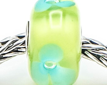 TROLLBEADS Turquoise bloem glaskraal sterlingzilveren kernbedel