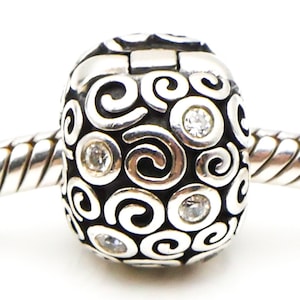 Charm clip PANDORA tourbillons abstraits en argent sterling avec zircons transparents