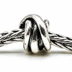 TROLLBEADS Abalorio de nudo de la suerte en plata de ley