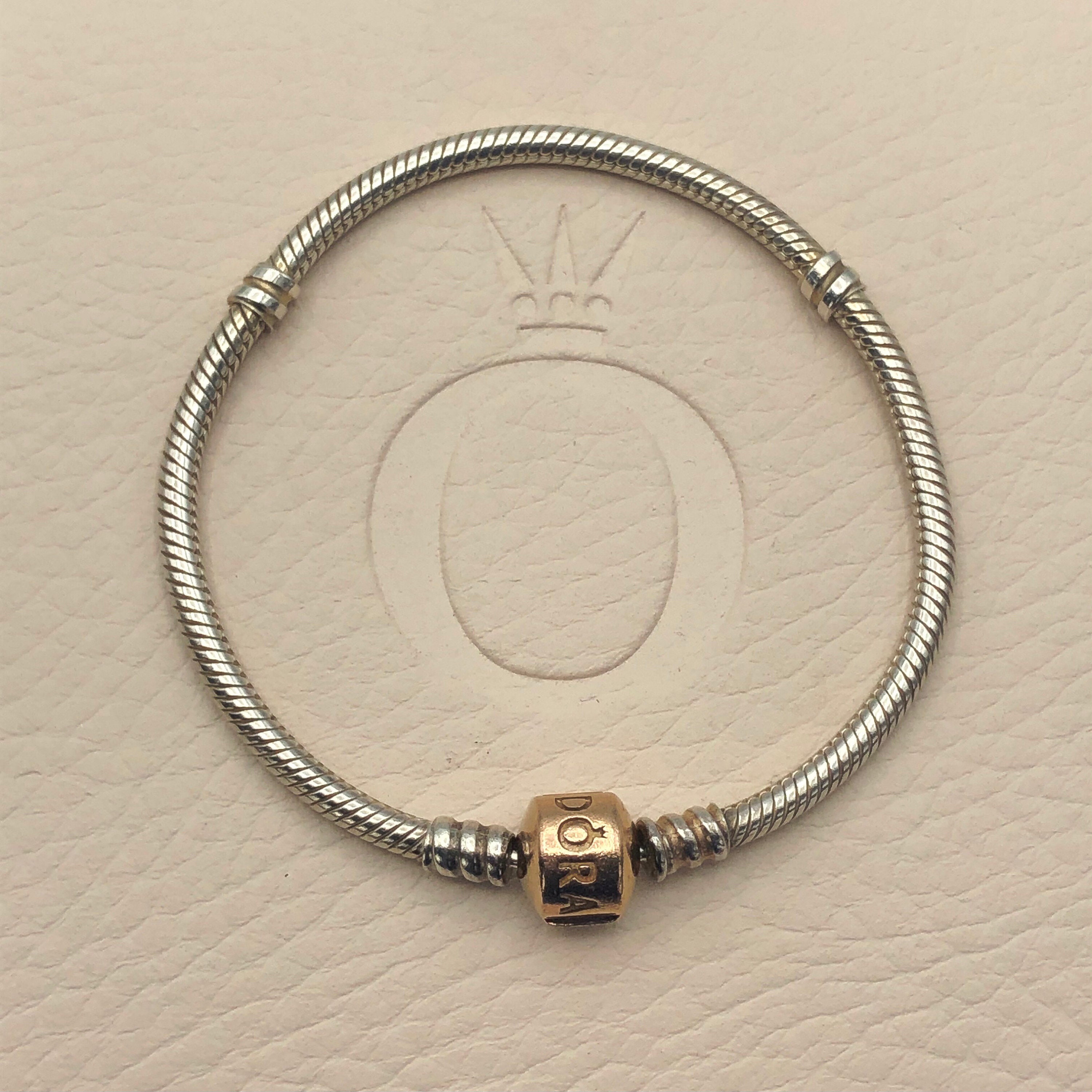 Sterling Silver Pandora Bracelet w/14K Yellow Gold Clasp & several Silver  Charms - Colonial Trading Company