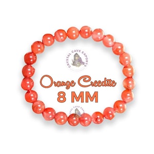 May include: Orange Creedite bracelet made with 8 mm beads. The bracelet is made of natural stones and has a bright orange color.