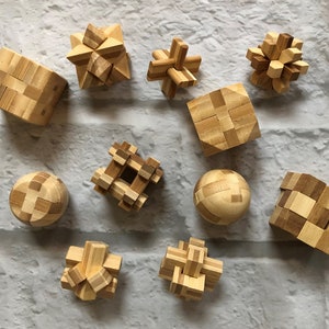 Handcrafted Wooden Puzzles Brain Teasers Kids Games 3D Wooden Interlocking Burr Puzzles Childhood Learning Toys image 1