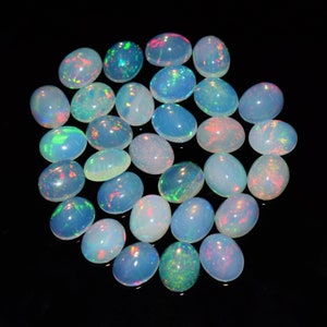 Ethiopian Opal 9x11 MM. Top Quality Oval Shape Calibrated Wholesale Lot fire opal Cabochon Natural Ethiopian Opal Pieces Wise Gemstone.