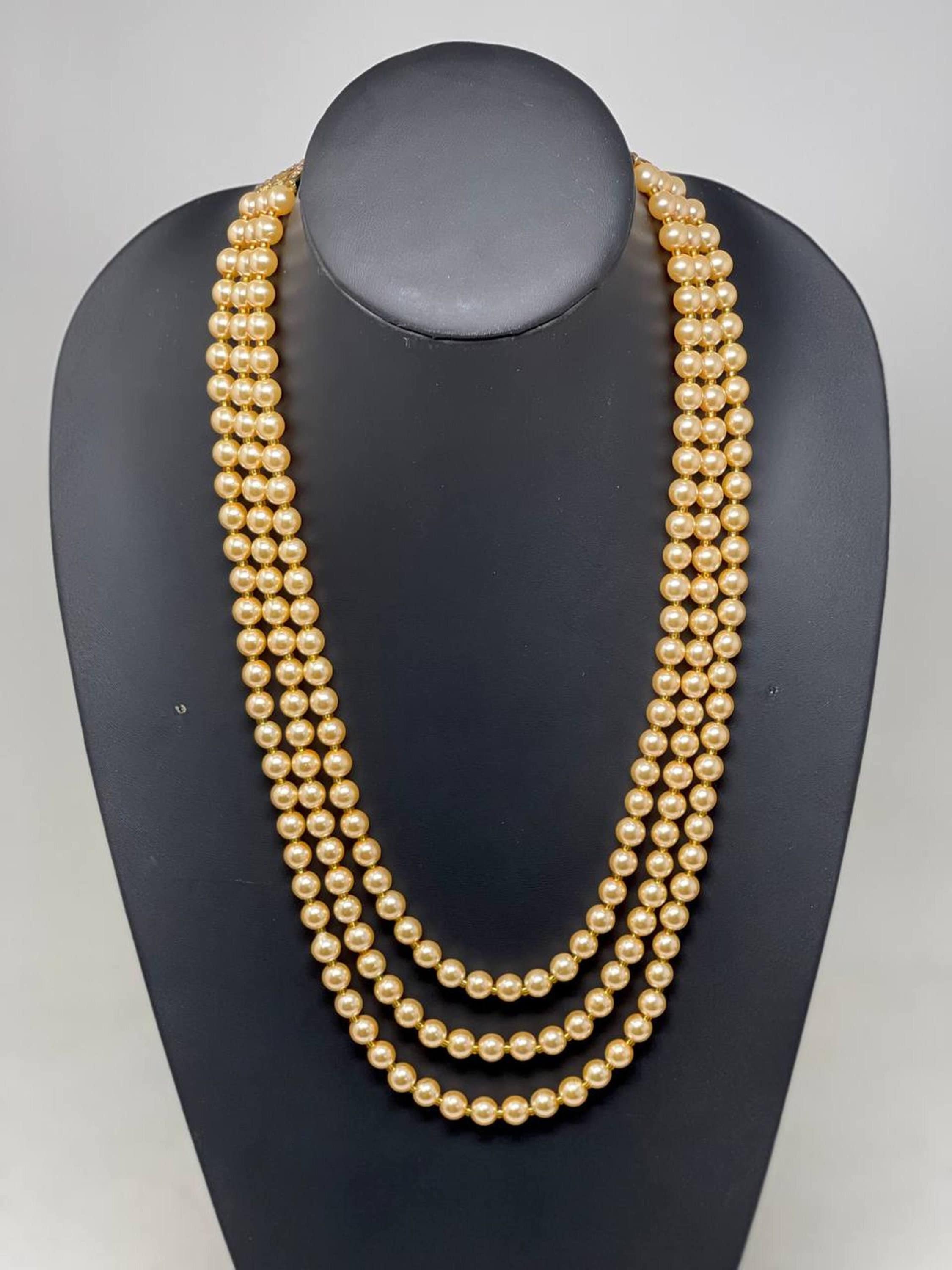 Moti mala with gold best sale