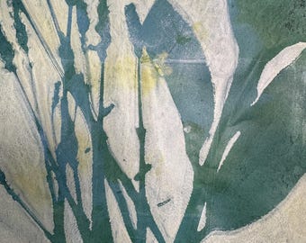 May include: Abstract art print with a green and white color scheme. The print features a series of vertical lines and shapes, creating a sense of movement and depth.