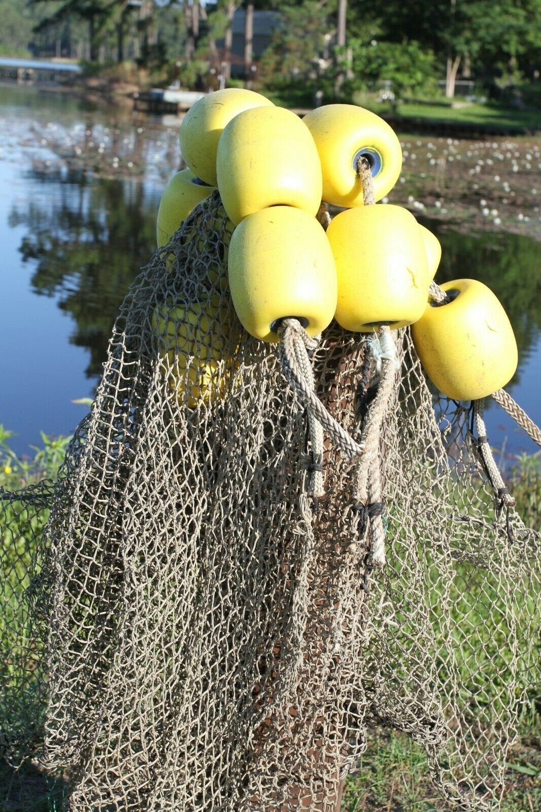 Fishing nets and floats on a spool of a small commercial fishing