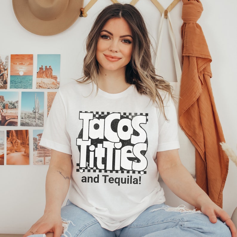 May include: White t-shirt with black text that reads "Tacos Titties and Tequila!" The text is in a retro font style.