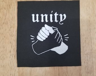 Unity punk patch anti Rassismus Aufnäher auf Leinwand