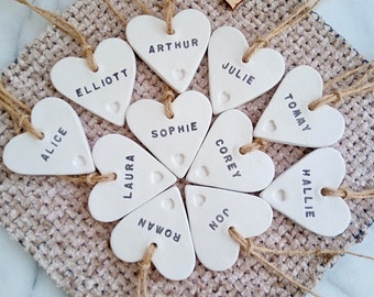 Personalised wedding place settings, Guests names, Table decorations, Wedding favours, Gift tags, Wedding keepsakes, Bespoke clay hearts