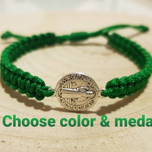 May include: Green braided bracelet with a silver Saint medal. Choose color & medal.