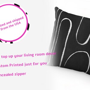 May include: Black and white throw pillow with a geometric pattern. The pillow has a concealed zipper. Printed and shipped from the USA.
