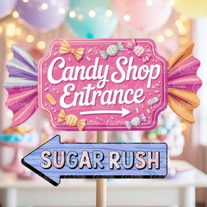 May include: A pink candy shop entrance sign with the words "Candy Shop Entrance" and an arrow. Below, a blue sign reads "Sugar Rush." The signs are decorated with candy illustrations and are mounted on wooden sticks.