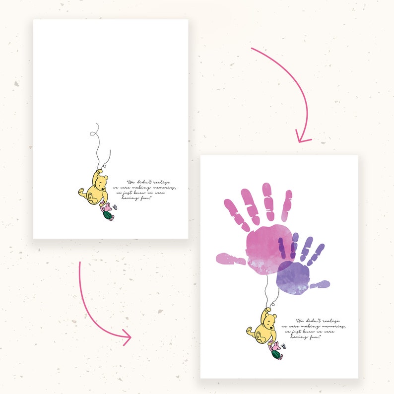 May include: Two white art prints. One features a yellow Winnie the Pooh and Piglet illustration hanging from a string. The other print shows two overlapping handprints in pink and purple watercolor. Text: "We didn't realize we were making memories, we just knew we were having fun!"