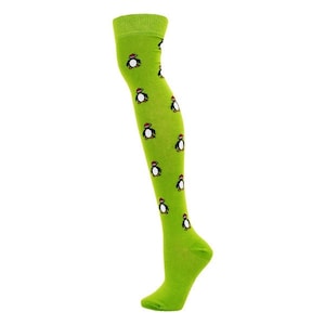 May include: Green thigh-high socks with a repeating pattern of penguins wearing red hats.