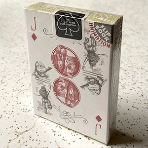 Alice Through the Looking Glass Playing Cards. Alice In Wonderland Luxury Playing Cards. Flip Book Playing Cards.