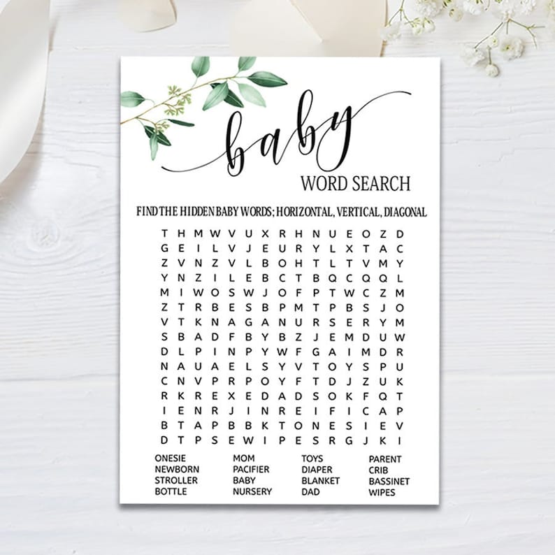 May include: A printable baby word search game with a green leafy design. The game features a grid of letters with words related to babies hidden within. The words are listed below the grid, including "onesie", "newborn", "stroller", "bottle", "mom", "pacifier", "baby", "nursery", "toys", "diaper", "blanket", "dad", "parent", "crib", "bassinet", and "wipes".