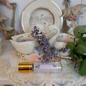 lilac magic essential oil roller, lilac essential oil, lilac perfume, happy oil