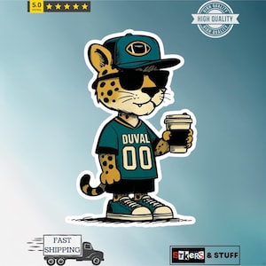 May include: A sticker featuring a cartoon jaguar wearing a teal football jersey with "DUVAL 00" and a matching cap. The jaguar is holding a coffee cup and wearing sunglasses. The sticker has a "High Quality" seal and a "Fast Shipping" logo.
