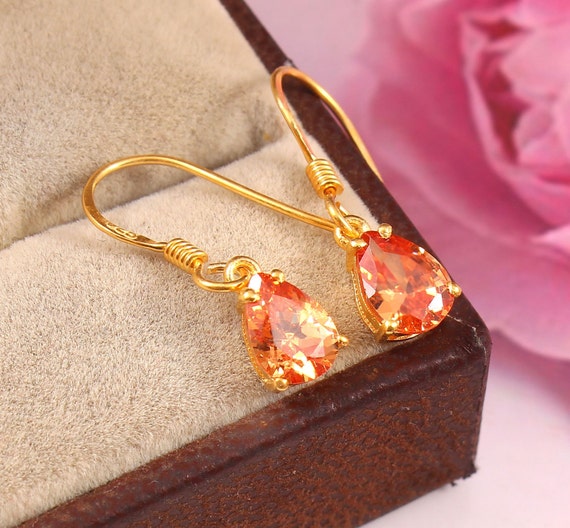Peach sapphire earrings deals