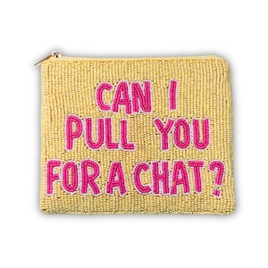 May include: A rectangular beaded pouch in a pale yellow color featuring the text CAN I PULL YOU FOR A CHAT? in bright pink beads. The pouch has a gold-toned metal zipper closure along the top edge and is entirely covered in small, uniform glass beads.