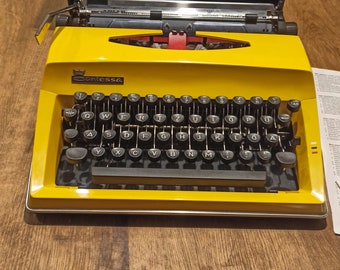 Schreibmaschine Adler Contessa Deluxe - 70er Jahre - Inklusive Anleitung - Reiseschreibmaschine - Space Age - Gelb - Deutsch