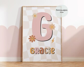 May include: A pink letter G with a yellow lightning bolt and flowers on a checkered background. The name Gracie is written in a colorful font below the letter.